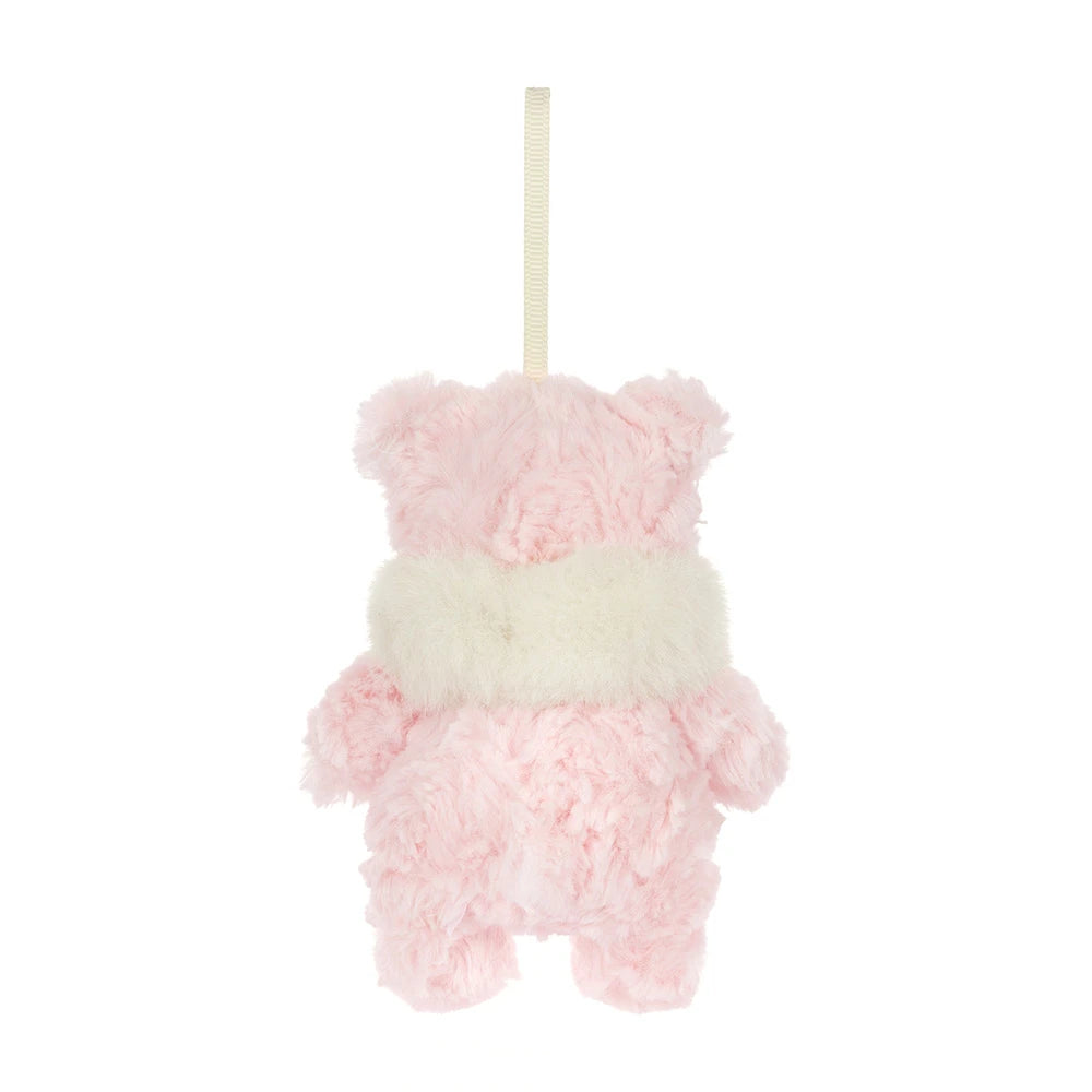 A pink fluffy teddy bear hanging ornament with a cream faux-fur chest detail and a cream hanging ribbon, shown against a plain white background.
