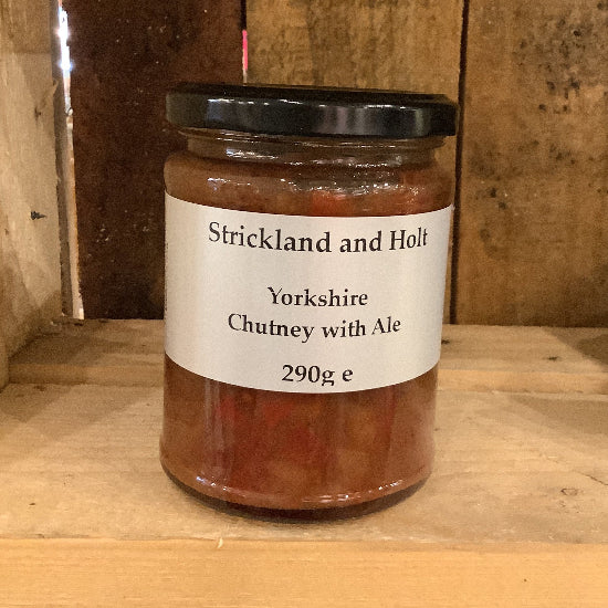 Jar of Strickland and Hall Yorkshire Chutney with Ale on a wooden surface