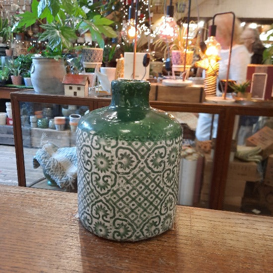 Green and white stem jar