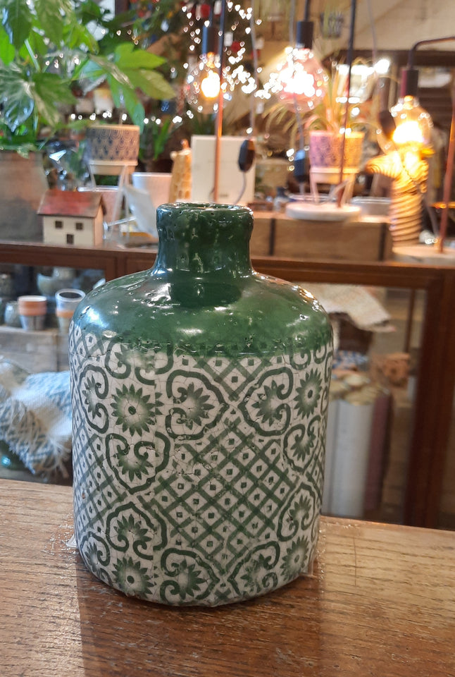 Green and white stem jar