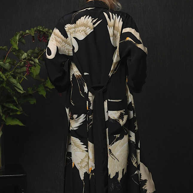 Luxe stork black crepe gown