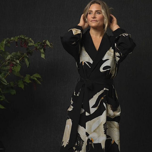 Luxe stork black crepe gown